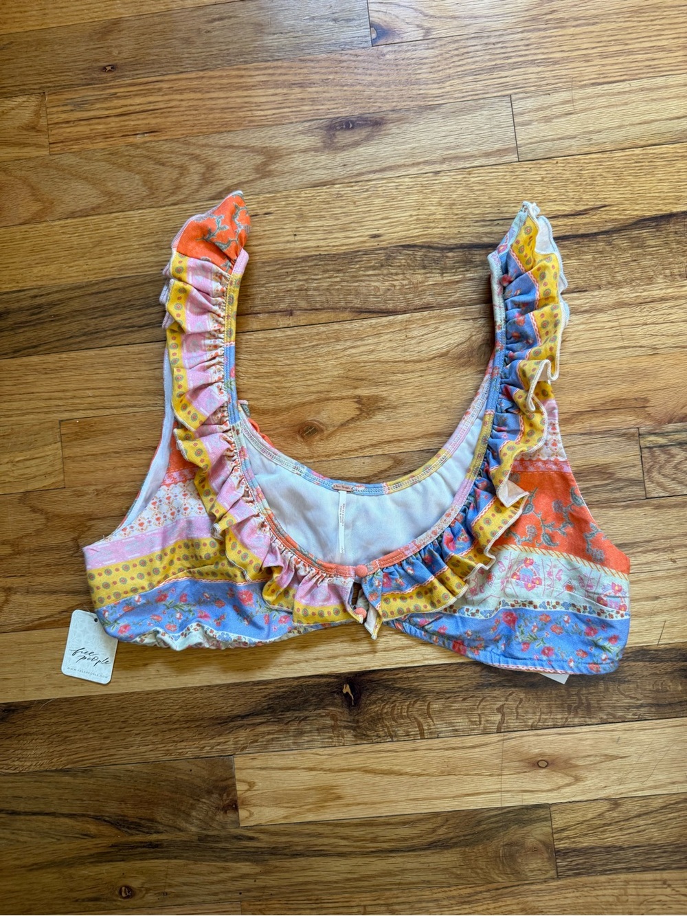 Free people as it was Ruffled Multi-Color Bikini Top new with tags size large